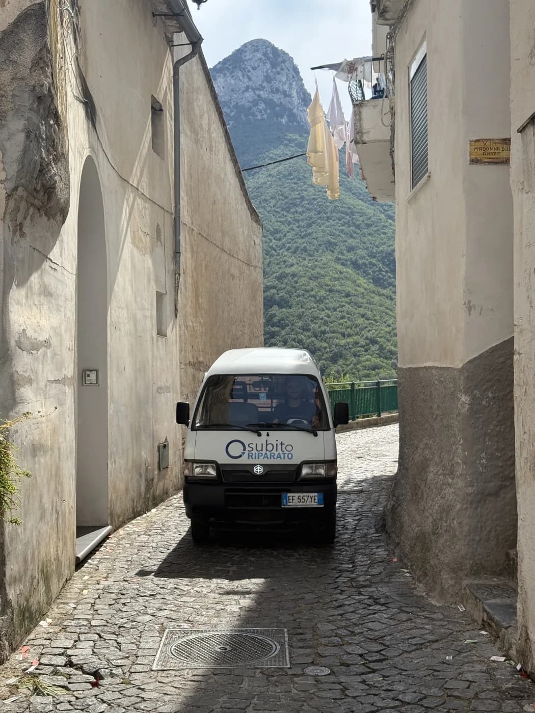The mobile-lab van reaching a hilltop village on the coast to repair a phone on the spot